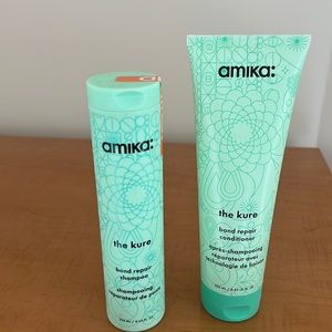 New, unopened Amika, the Kure, bond repair shampoo and bond repair conditioner.